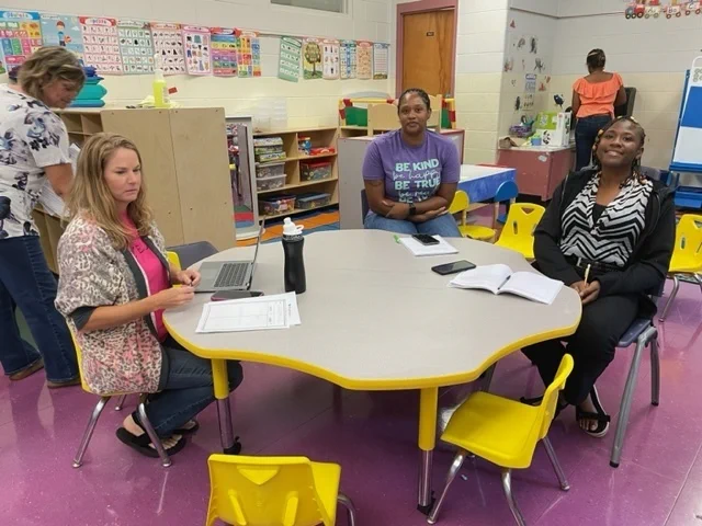 Teachers at tables