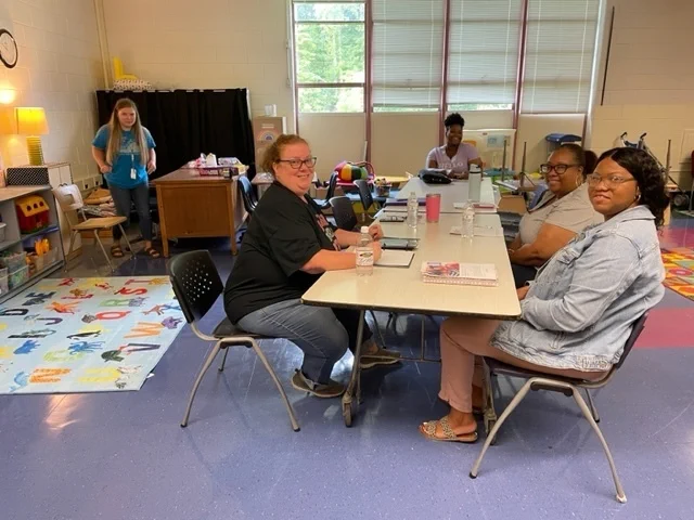 Teachers at tables