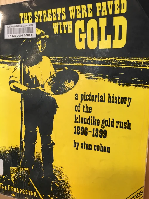 Cover of the library book "The Streets were paved with Gold: a pictorial history of the klondike gold rush 1896-1899" by Stan Cohen.