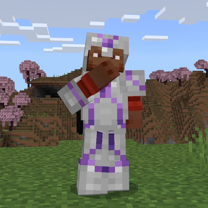 Noor wearing iron armor trimmed with amethyst using the Tide armor trim