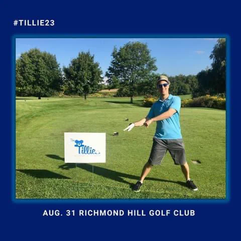 Organizer points to Tillie sign on golf course