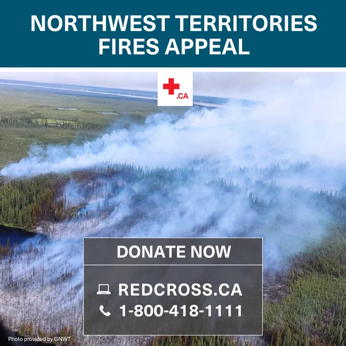 Northwest Territories Fires Appeal. Donate now at redcross.ca or by calling 1-800-418-1111. Photo of wildfires burning in Northwest Territories. 
