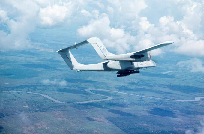An OV-10A Bronco twin engined aircraft, (67-14619) flying over a province in South Vietnam. P05581.002