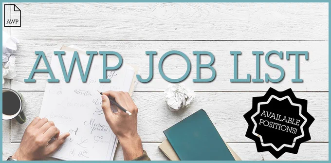 AWP Job List Available Positions! over a bird's eye view of a writer's desk
