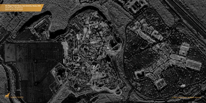 Six Flags Fiesta Texas spans 200 acres (81 ha) and was originally built as a musical show park. The park’s landmark attraction is the “Scream” drop tower standing 205 feet (about 62 meters) tall, visible as a bright tower at the top of the image.  