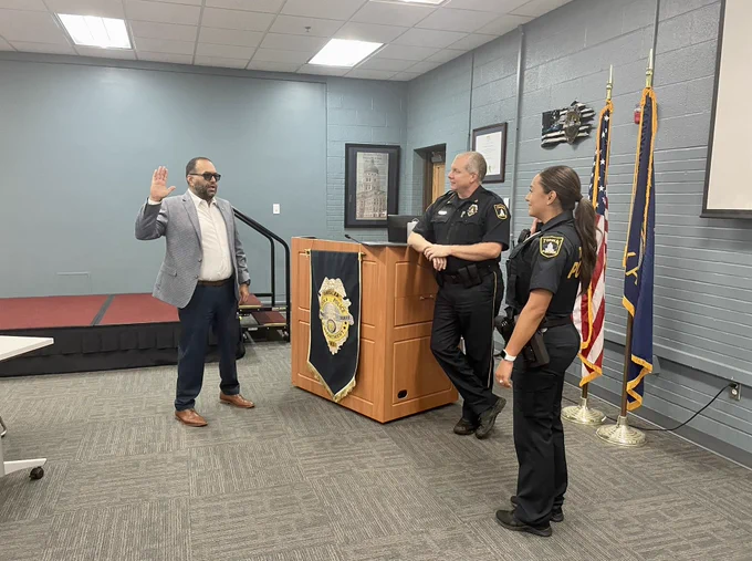 Judge Thadani swears in Officer Schulz.
