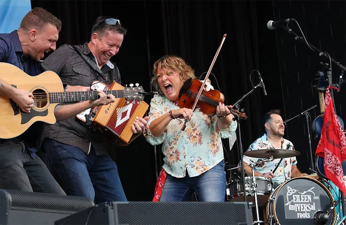 Eileen Ivers and band performing at Milwaukee Irish Fest