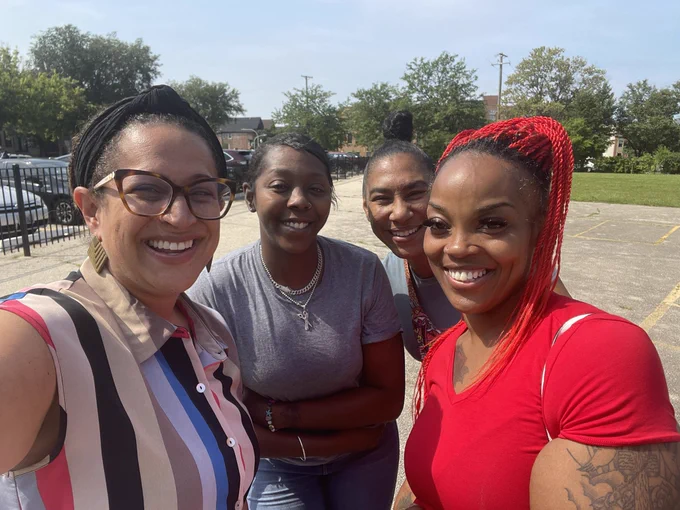 Selfie with 3 1st grade parents—one who attended Robinson when she was a child