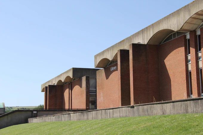 The front entrance of Sussex Library on a sunny summer's day.