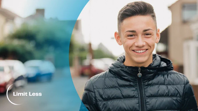 Image of a young person smiling, with the IOP Limit Less logo in the background.