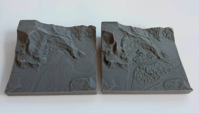 3D prints of pre-Oso landslide (left) and post-Oso landslide (right) made using stereolithography (SLA) resin 3D printing.