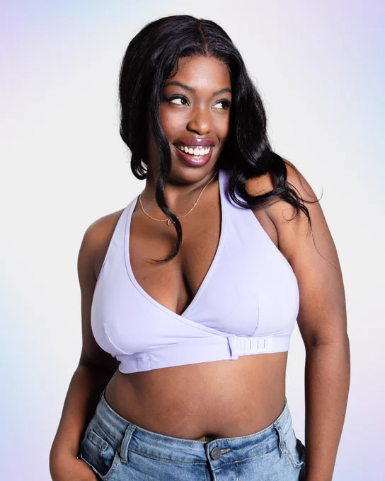 Slide 4: Model with long black hair is wearing the new lilac Wrap Bralette.