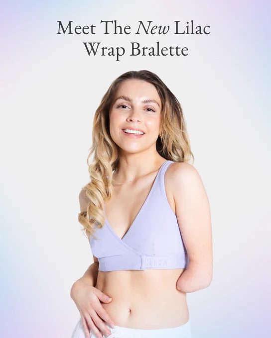 Slide 1: Model with blonde hair and an upper limb difference is wearing the new lilac Wrap Bralette.