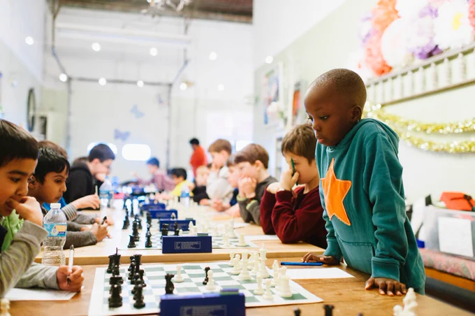 Image of kids playing chess