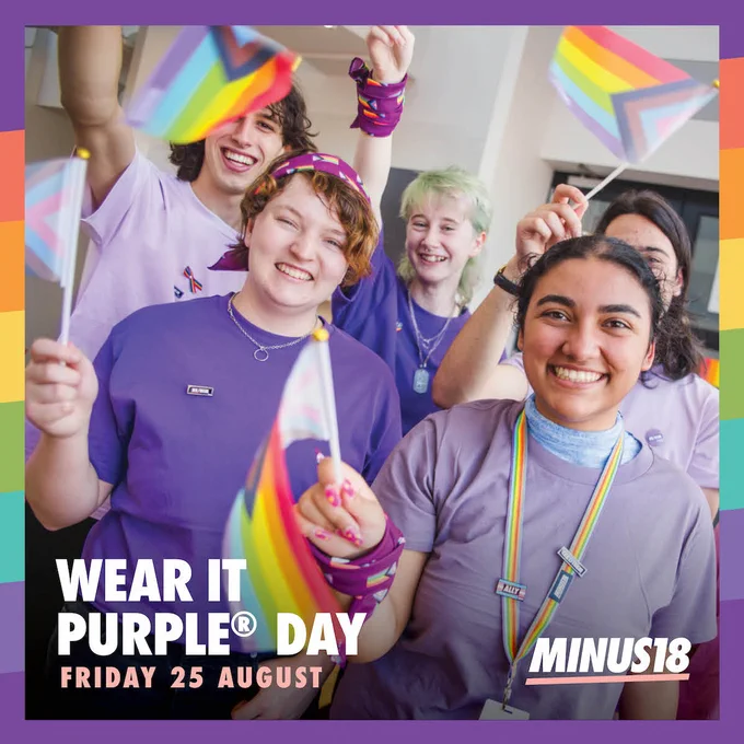 An image of a group of young people waving pride flags. There is a purple and rainbow border. At the bottom it reads "WEAR IT PURPLE® DAY FRIDAY 25 AUGUST" with the Minus18 logo.