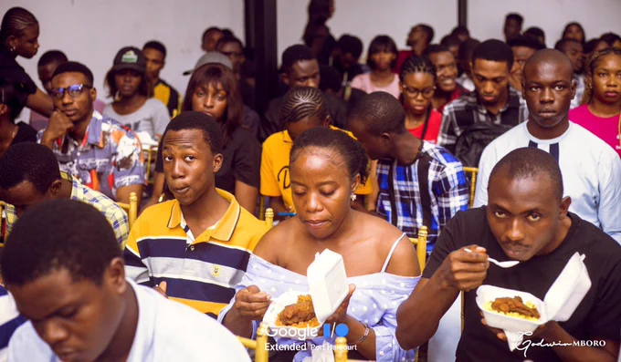 Google I/O Extended Portharcourt Attendees eating their meal