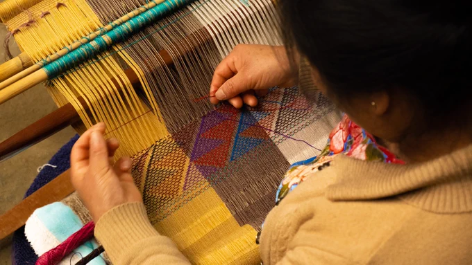 Person weaving,