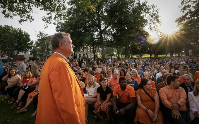 President Rogers looking out at students at Convocation