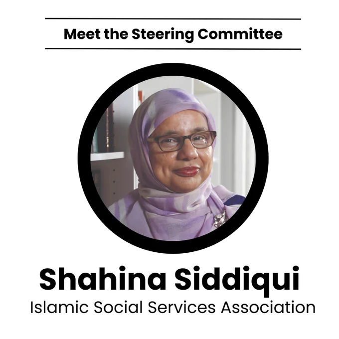 An image of a Pakistani Canadian woman, is wearing a purple hijab and purple glasses. She is smiling in front of a bookcase. Text on the image reads: “Meet the Steering Committee. Shahina Siddiqui; Islamic Social Services Association.”