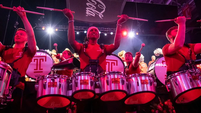Temple Band members perform to the crowd