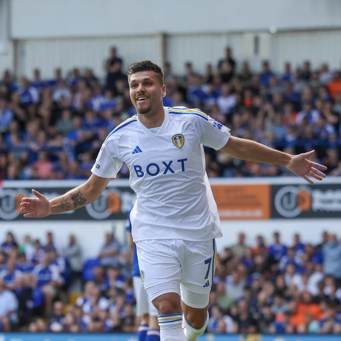 Joel Piroe celebrates scoring on his debut
