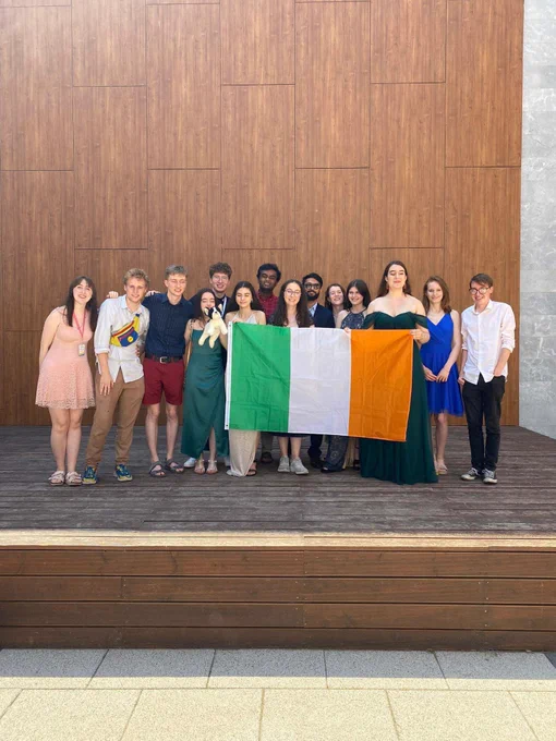 The Hist contingent at Euros 2023 holding an Irish flag