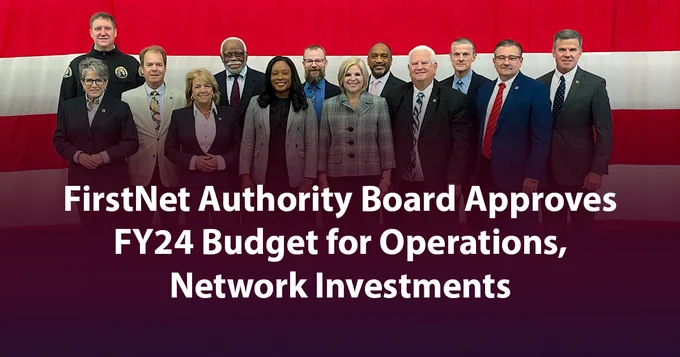 FirstNet Authority Board stands in front of a flag; "FirstNet Authority Board Approves FY24 Budget for Operations, Network Investments"