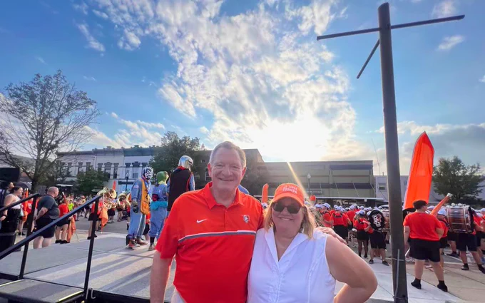 BGSU President and wife Dr. Earle take a photo at Rally BG