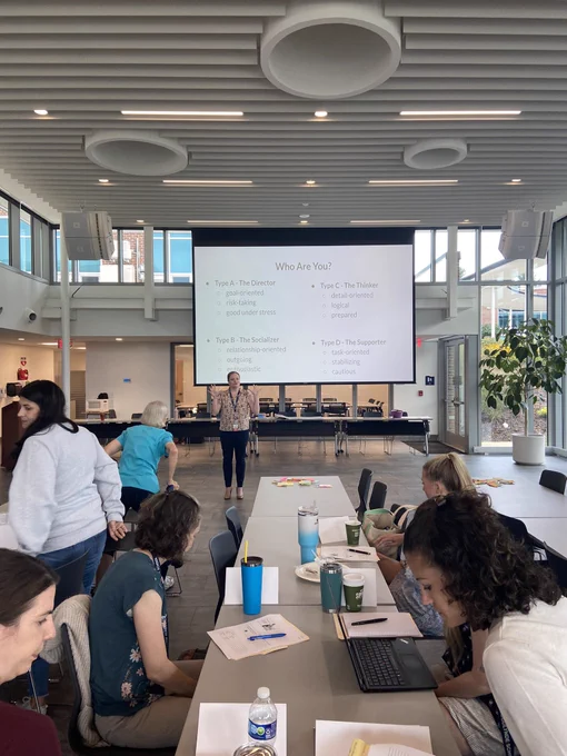 A group of teachers in a professional development UDL workshop discussing how context matters in lesson design.