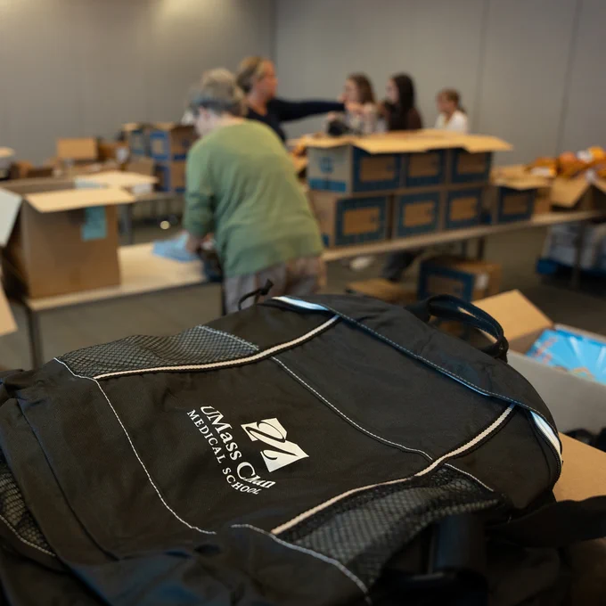 UMass Chan backpack in the foreground