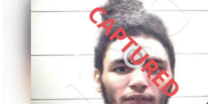 Mugshot of black male.