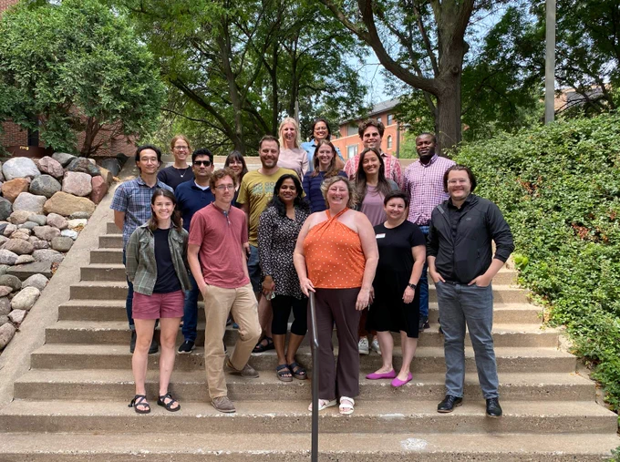 IonE staff pose for a photo outside with the new Postdoctoral Fellowship Program fellows