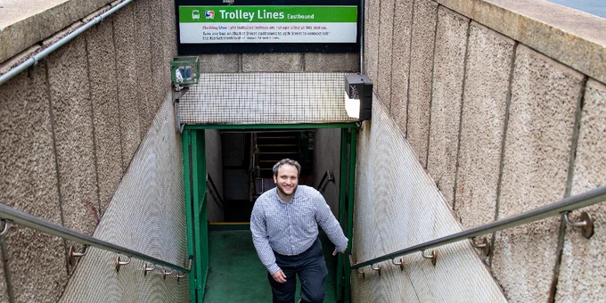 Person coming out of the Trolley Line tunnel.