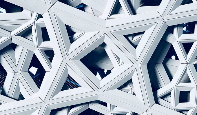 Zoomed in picture into the Abu Dhabi Louvre Museum showing white symmetrical shaping. FundApps implements suite of compliance solutions to ADIA which include shareholding disclosure, position limits & sensitive industries.