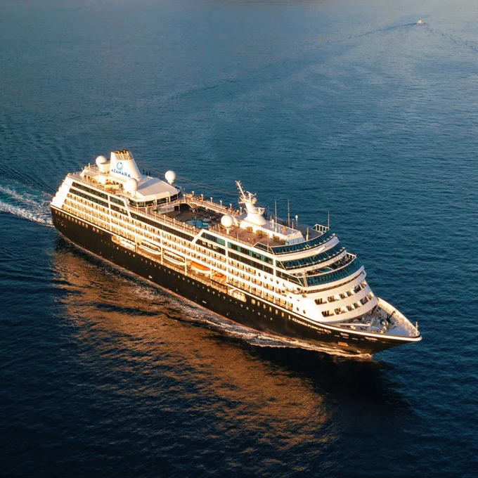 Luxury cruise ship sailing on the ocean. 