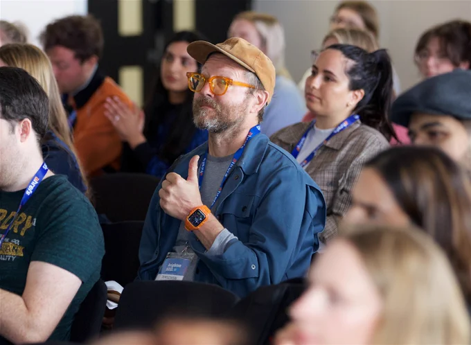 Thumbs up guy giving the thumbs up in the audience at brightonSEO in April