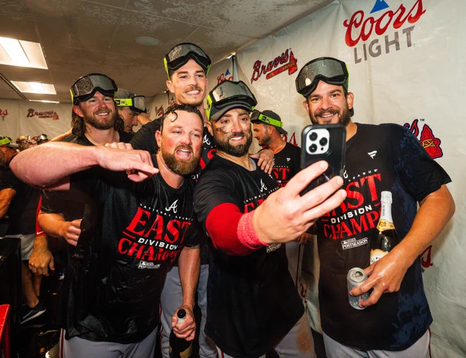 Braves pitchers all pose for a group selfie  during tonight’s clubhouse celebration.