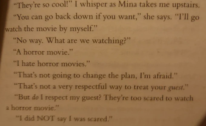 Paragraph of text where two friends banter about horror movies & respective bravery