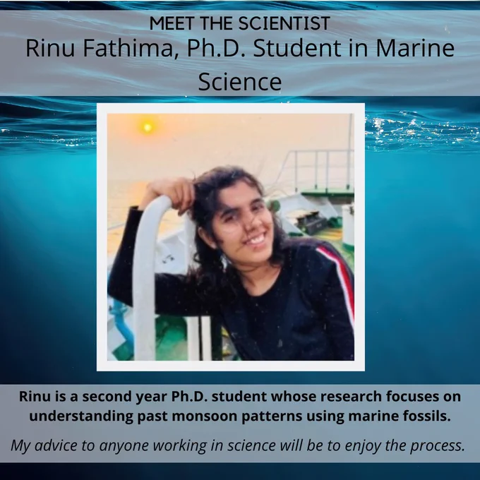 Foreground: Image of a person smiling, with their arm holding onto the side of a ship. A sunset is in the background of the image. Background: view of sunbeams streaming through light blue ocean waters. Text reads: Rinu is a second year PhD student whose research focuses on understanding past monsoon patterns using marine fossils. 'My advice to anyone working in science will be to enjoy the process'