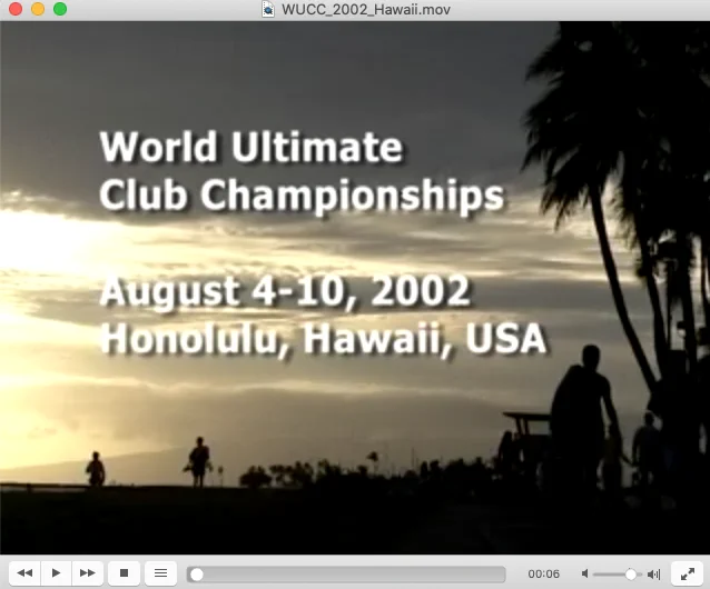 Still from the intro of a video showing silhouettes of 3 people in the distance on a beach against a dark cloudy sky. Title: "World Ultimate Club Championships – August 4-10, 2002, Honolulu, Hawaii, USA"