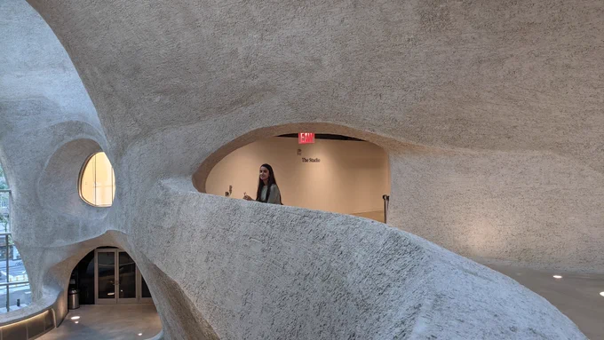 Safinah Ali stands on a walkway at the Richard Gilder Center for Science, Education, and Innovation. Credit: Courtesy of Safinah Ali