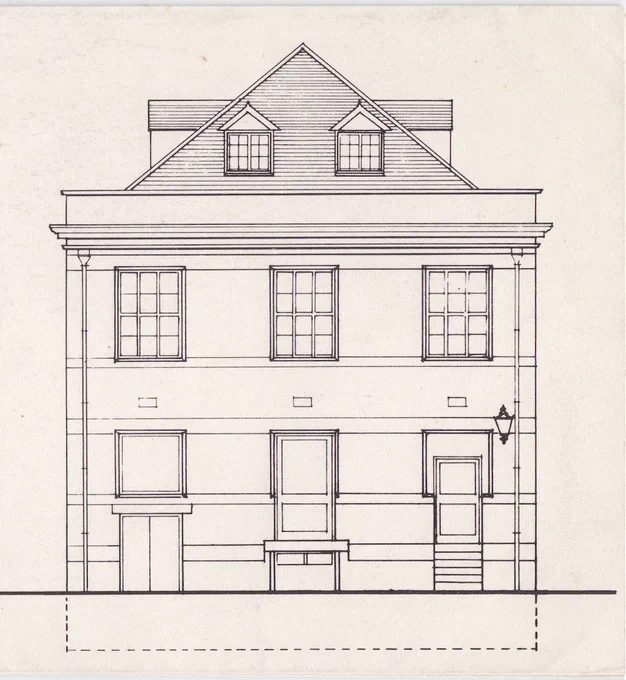 Architectural plans showing the front of a town building with windows in the roof and large doors on the front