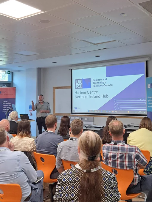 Justin Quinn presents to an audience at the Northern Ireland Hub Launch.