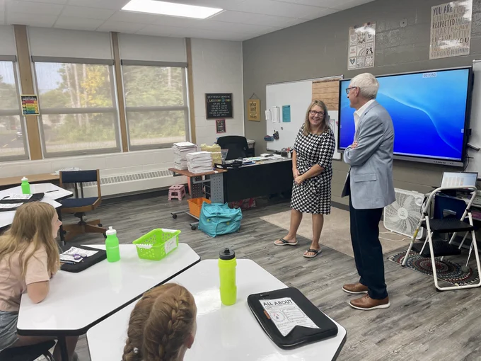 Gov. Evers visits a class and speaks with an educator.