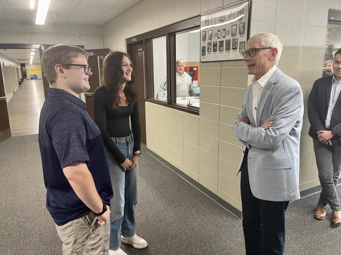 Gov. Evers speaks with students.