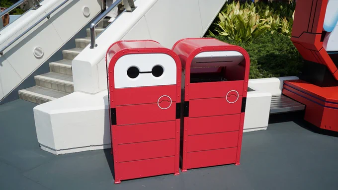 Red trash cans at Tokyo Disneyland decorated to look like Baymax from Big Hero 6