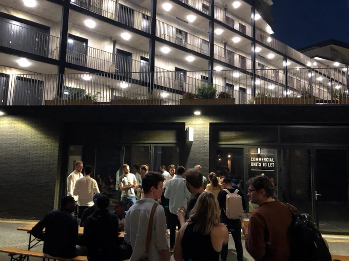 An image of the Plug and Play UK end of summer gathering guests stood outside.