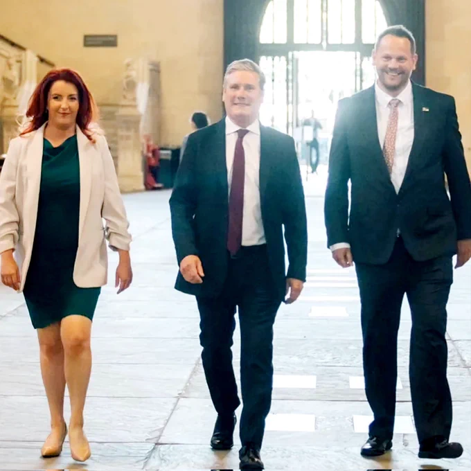 Simon Lightwood MP with the Leader of the Labour Party, Sir Keir Starmer and Shadow Secretary of State for Transport, Louise Hague MP walking through Westminster Hall.