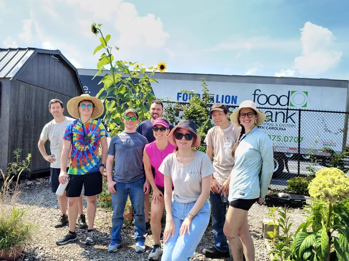 Ndustrial team members volunteering at the Raleigh Food Bank's community garden