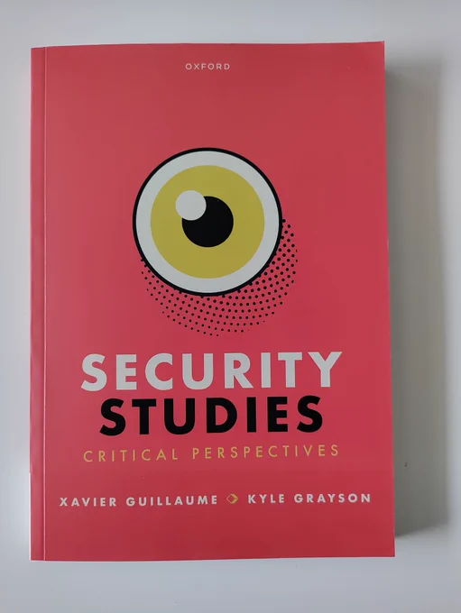 Cover of book with red back ground and single eye